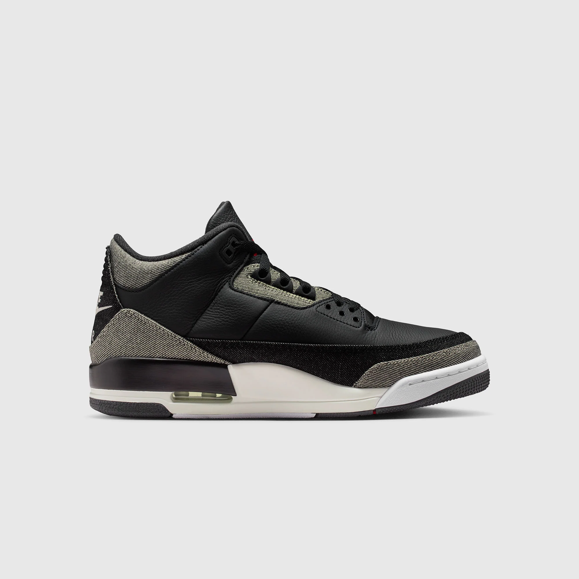 Air Jordan 3 x LeviāsĀ®
Black Denim Sneakers - Image 10