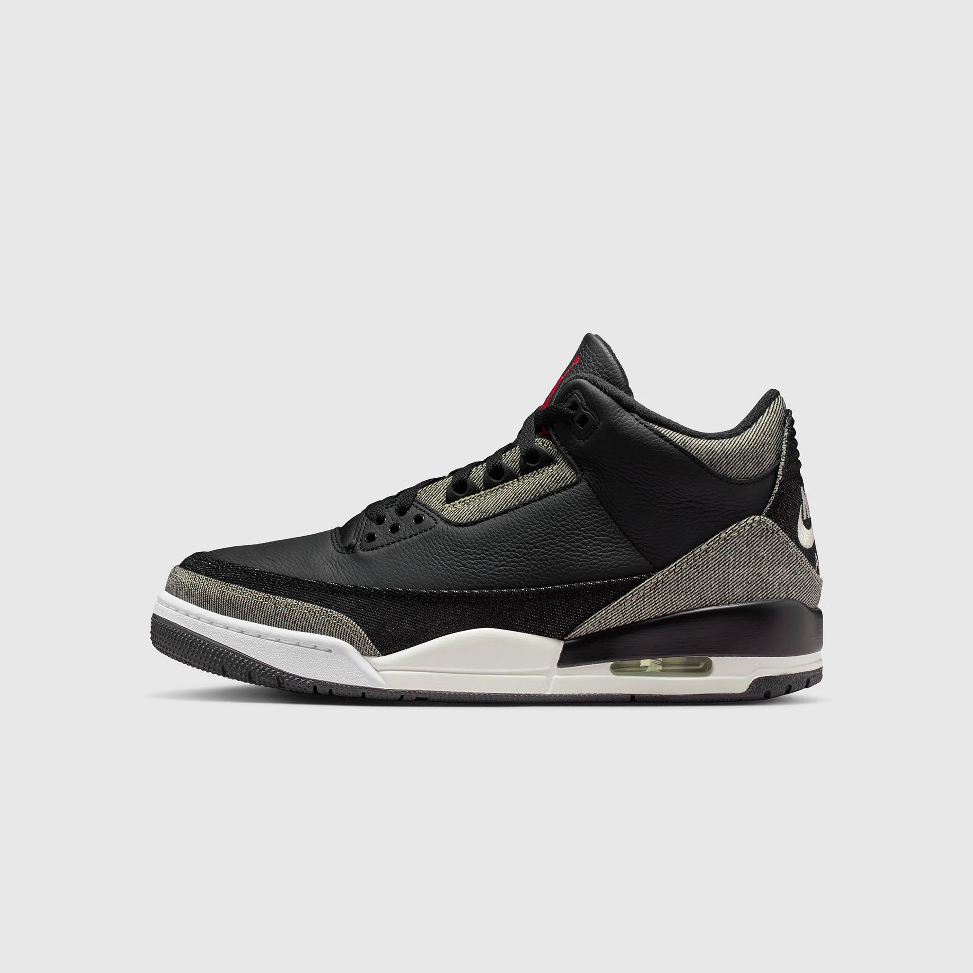 Air Jordan 3 x LeviāsĀ®
Black Denim Sneakers - Image 8